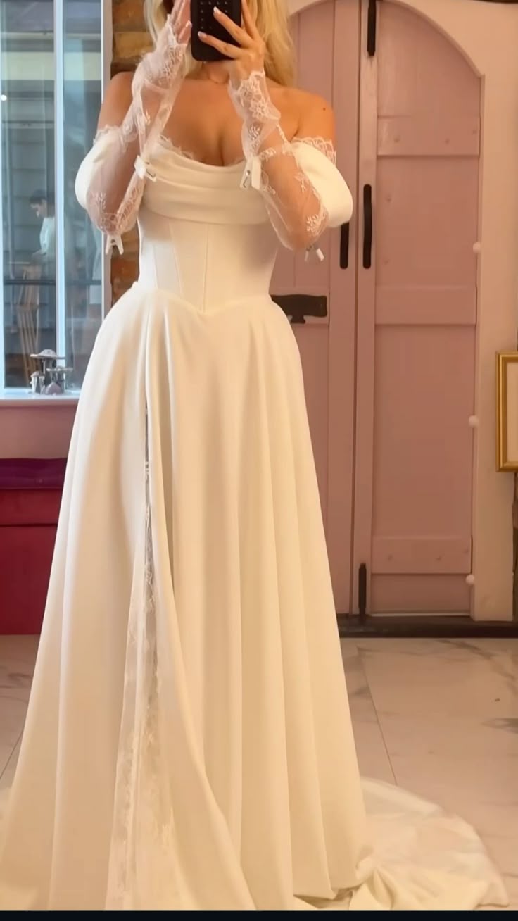 Robe de mariée longue en dentelle à épaules dénudées et manches longues fg7492