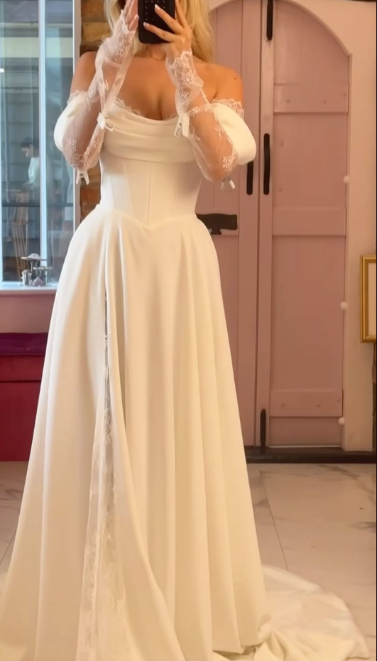 Robe de mariée longue en dentelle à épaules dénudées et manches longues fg7492