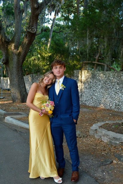 blue suit yellow dress Yellow looks stunning with blue Rentals are still available for ALL PROMS!!! No appointment needed, come by and see us at Slade to book your prom suit today! #prom #promseason #
