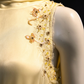 Pale Yellow High Neck Sleeveless Evening Gown with Hand-Beaded Floral Details & Ostrich Feather Trim fg9038