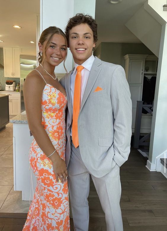 blue suit orange dress A bright citrus-colored modern Hawaiian elopement
